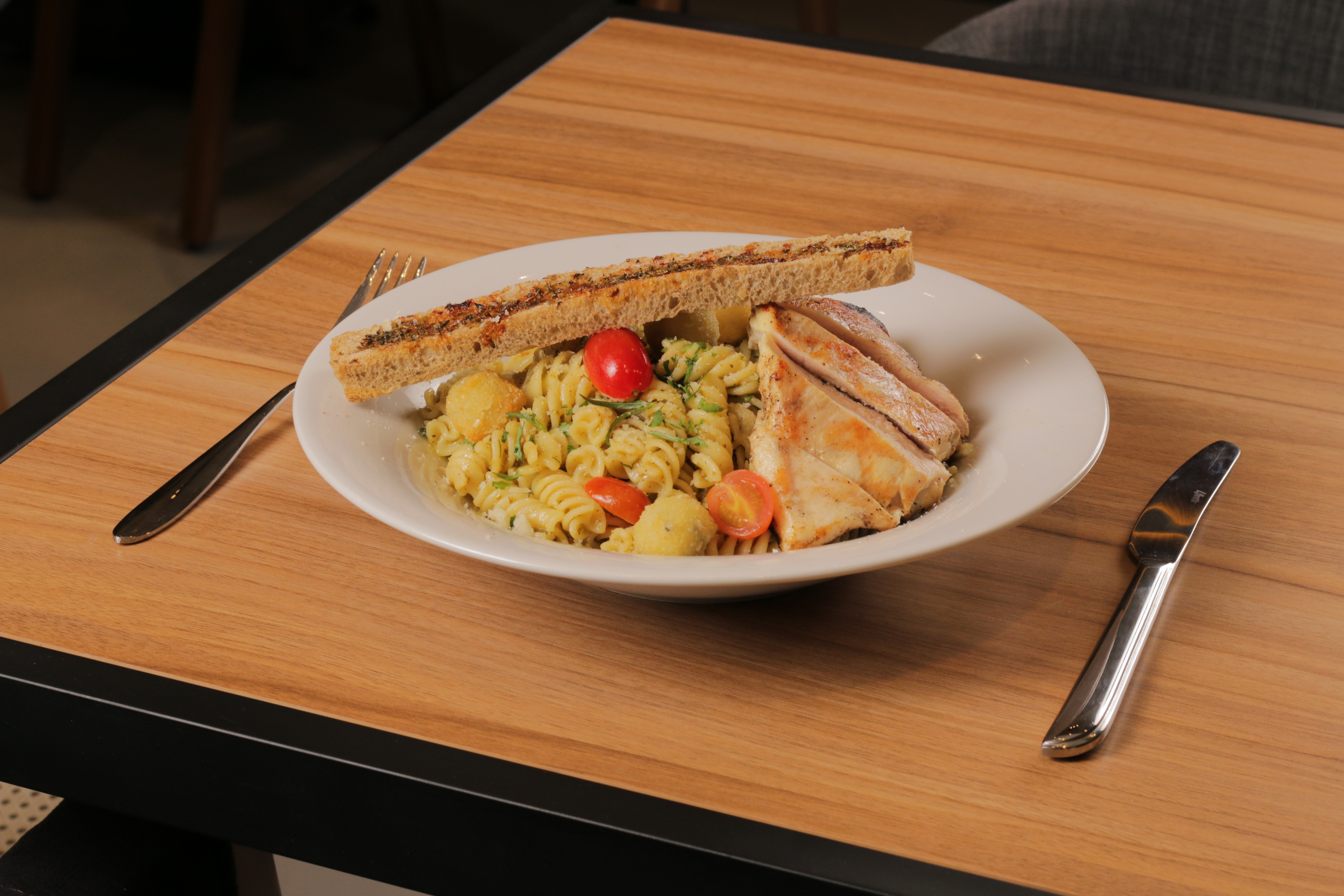 Your choice of pasta: spaghetti , penne , fettuccine , fusilli , with your choice of chicken or ground beef